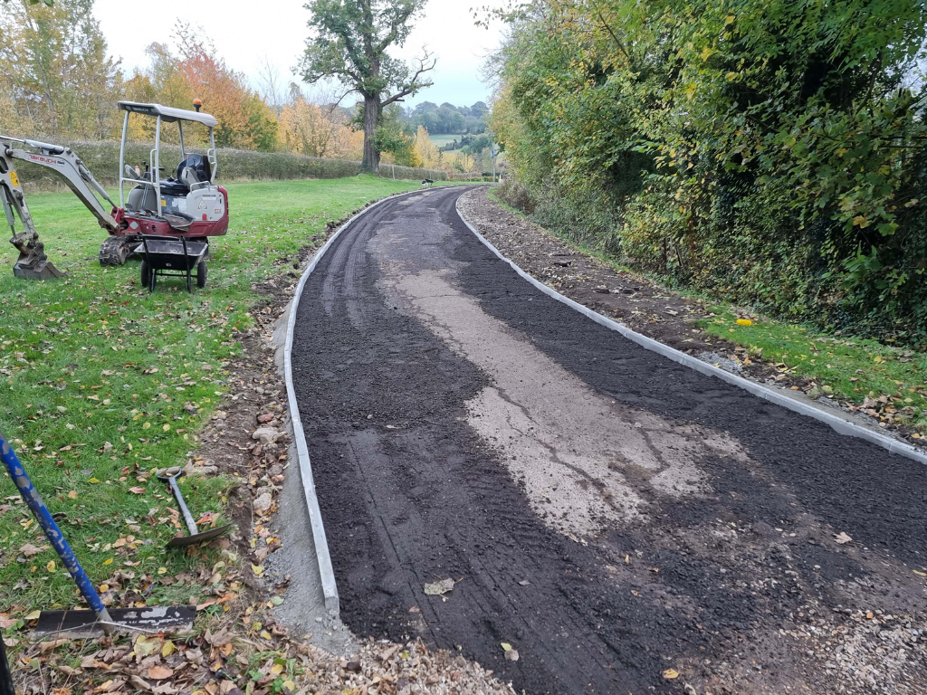 This is a large driveway which is in the process of having a tar and chip driveway installed on by Wroxham Driveways